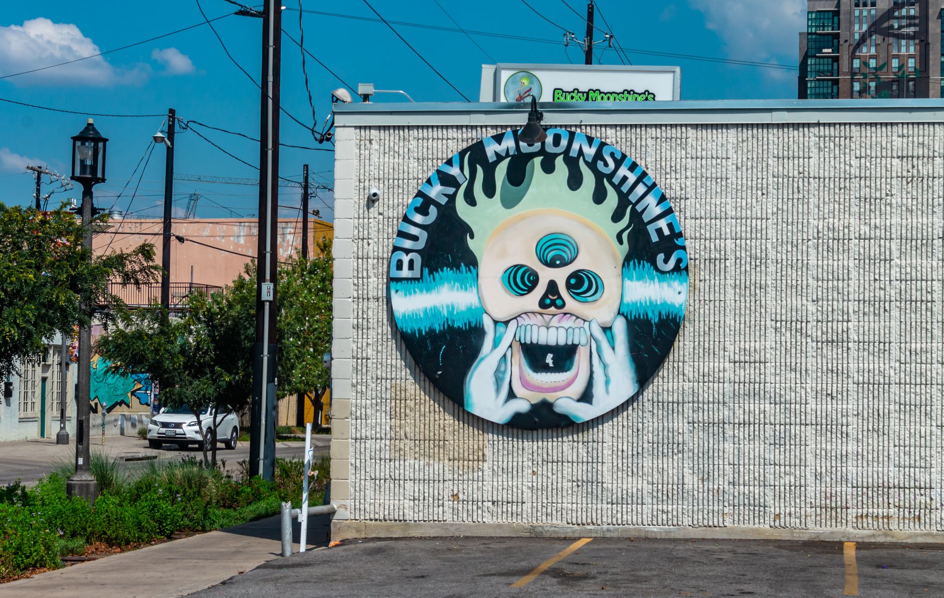 A restaurant sign on a Dallas street in Bishop Arts