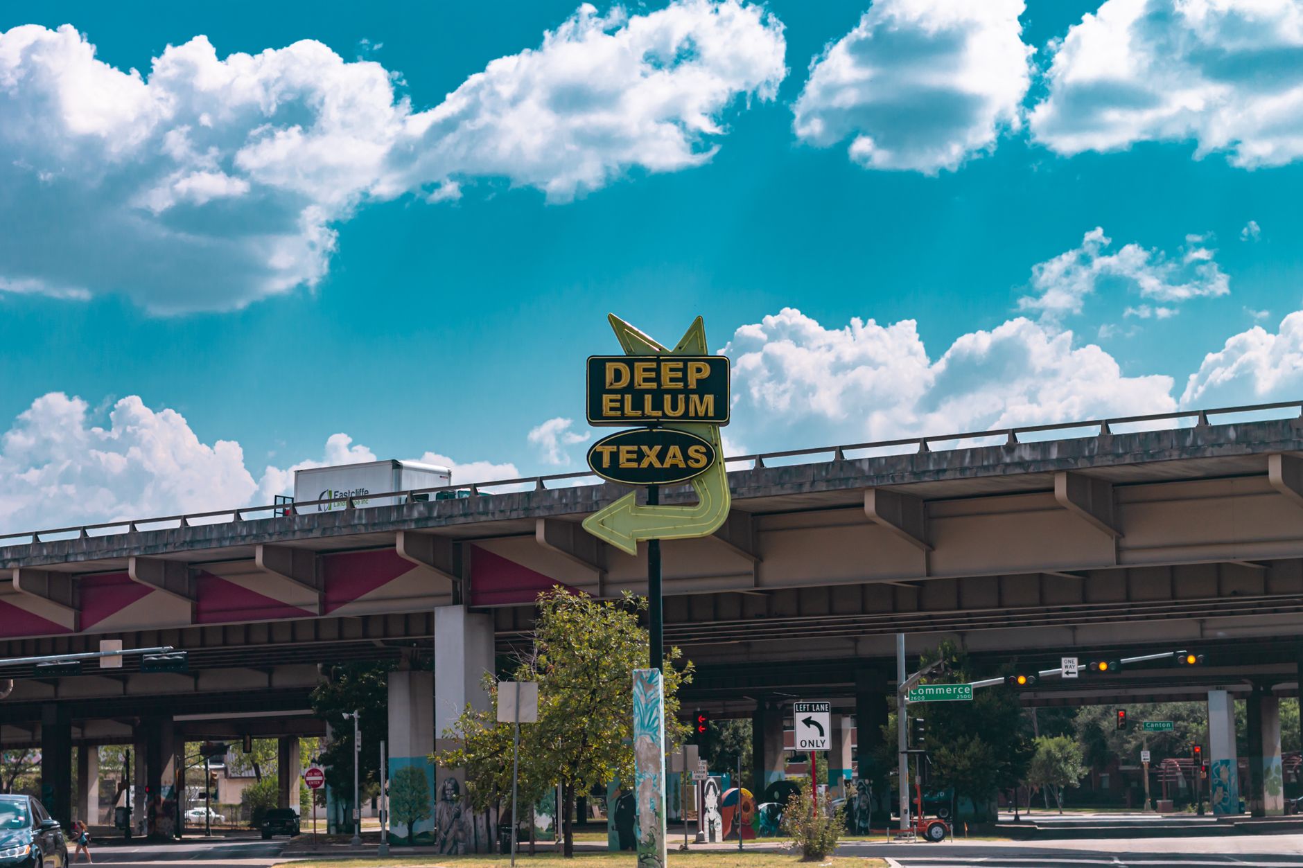 The Deep Ellum sign under an overpass in Dallas